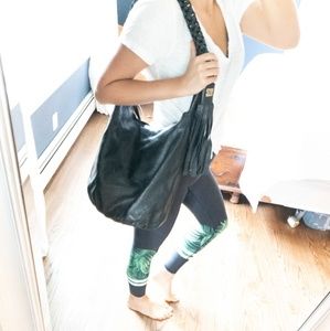 Givenchy black leather bag with tassles.